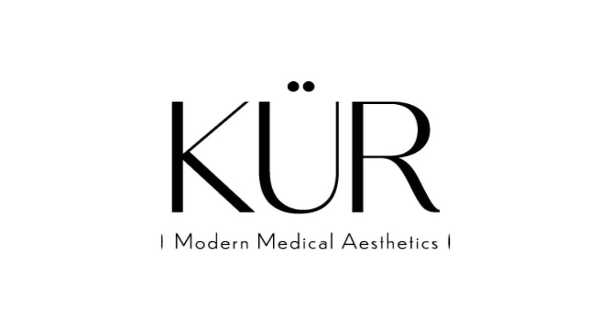 Clean, professional medical spa treatment room with neutral tones at KÜR Modern Medical Aesthetics in Cleveland